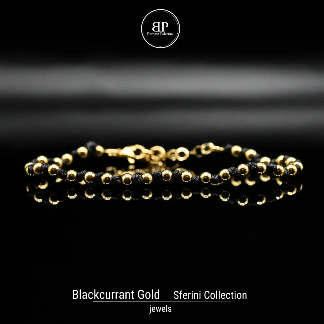 Schwarzes Johannisbeer-Goldarmband – Raffinesse und Luxus am Handgelenk