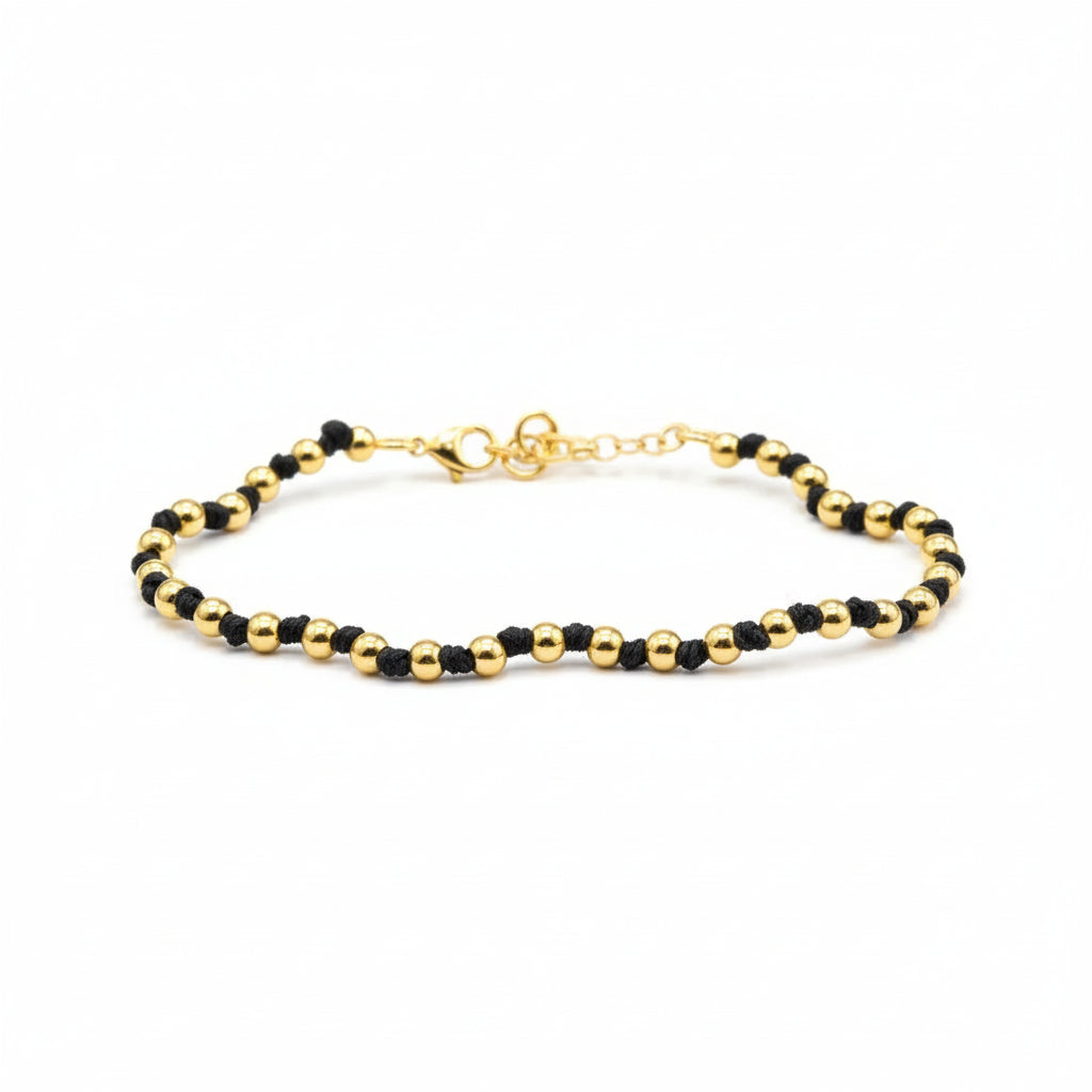 Schwarzes Johannisbeer-Goldarmband – Raffinesse und Luxus am Handgelenk