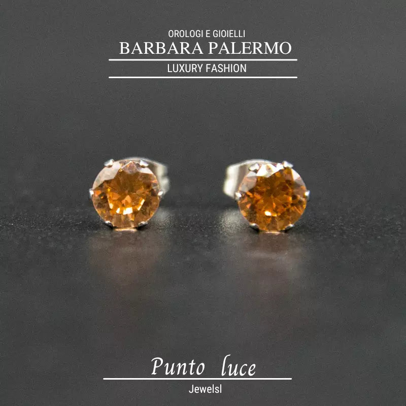 Orecchini Punto luce acciaio 316 L cristalli champagne