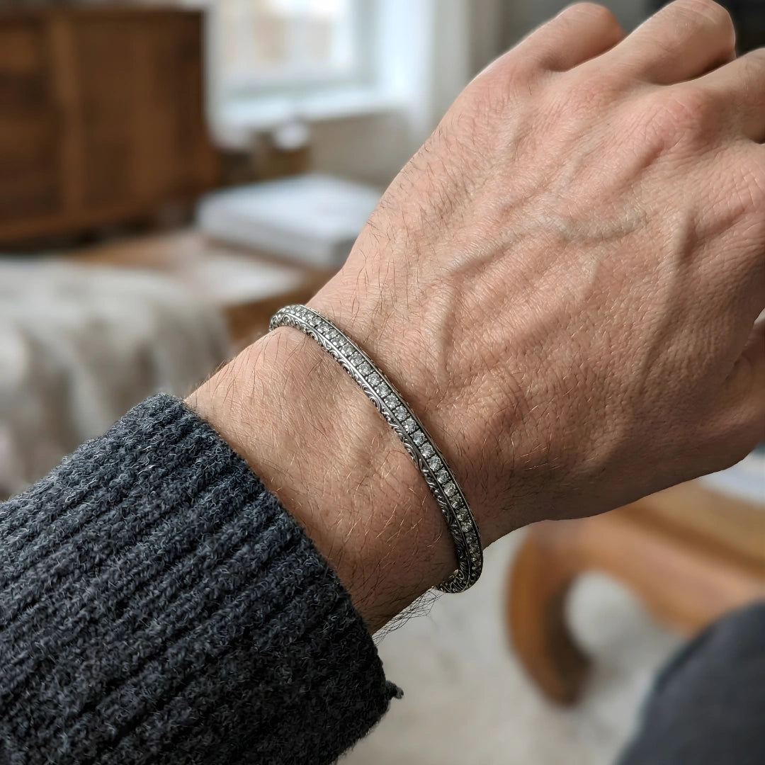 Tennisarmband aus Stahl mit titanbeschichteten schwarzen Zirkonia