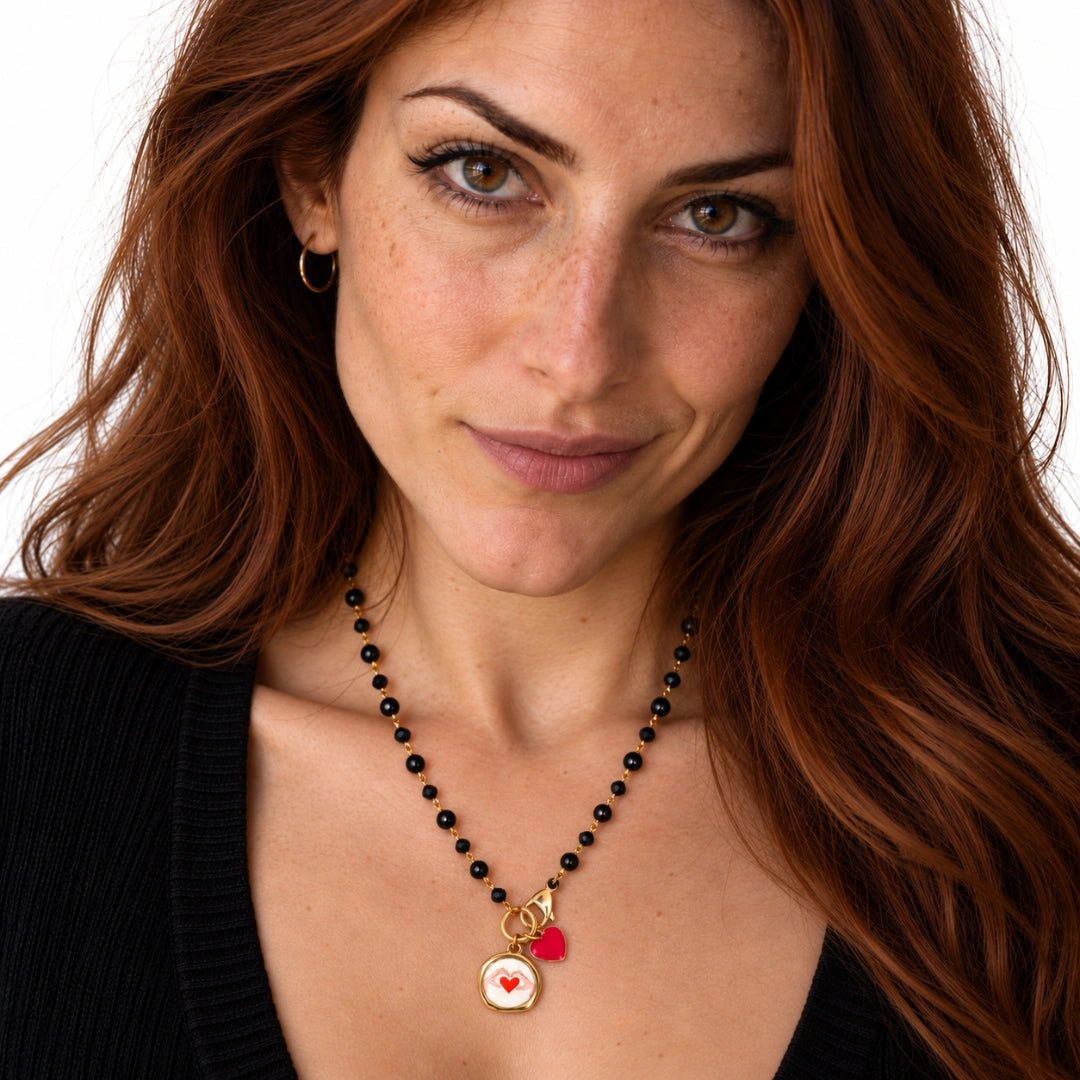 Collana Favola Cuore tra le Mani con Cristalli Neri Oro