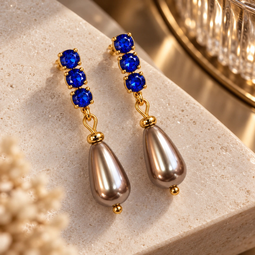 Orecchini NÉA Goccia Bronzo Perlato con Zirconia Blu Zaffiro Oro