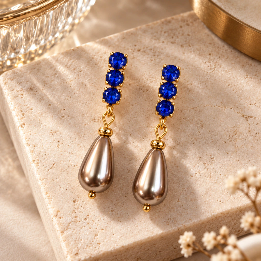 Orecchini NÉA Goccia Bronzo Perlato con Zirconia Blu Zaffiro Oro